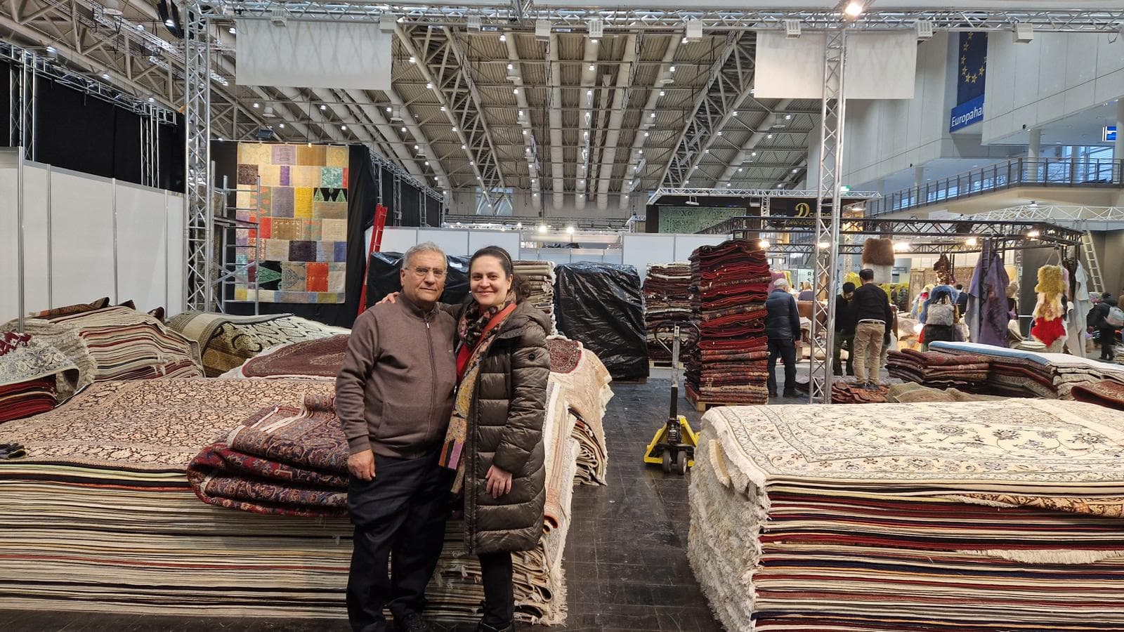 Team at the carpet trade fair